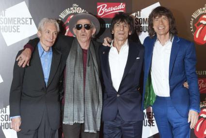 The Rolling Stones pose as they arrive for the opening of the exhibition "Rolling Stones: 50" at Somerset House in London