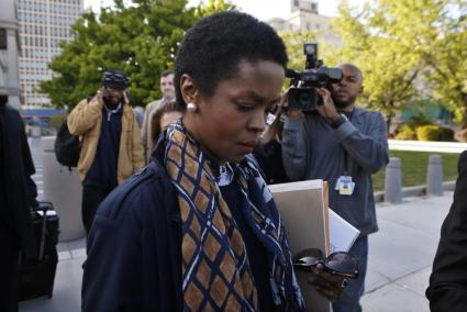 Hip hop artist Lauryn Hill leaves United States Court after a sentencing on federal tax evasion charges in Newark