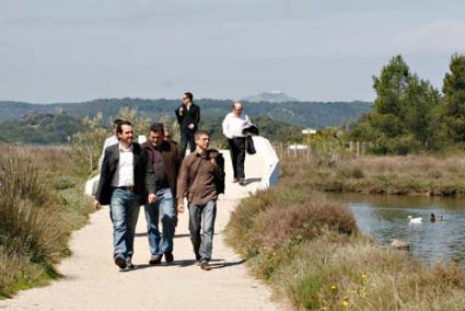 Es Grau. Authorities enjoying a quiet walk along the path