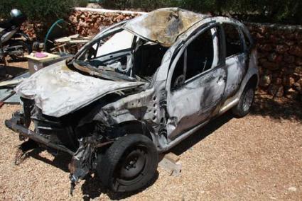 Wrecked. The car caught fire after hitting the safety barrier