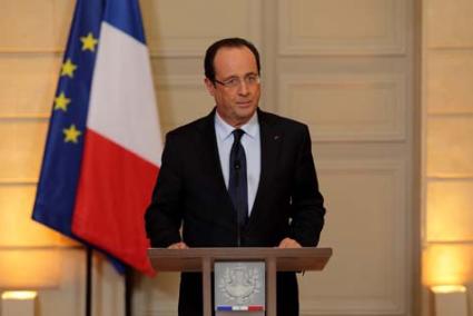 HOLLANDE. El presidente ompareció ayer desde el Elíseo - Reuters