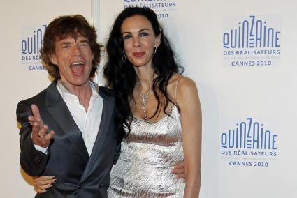 Mick Jagger junto a su novia L'Wren Scott,