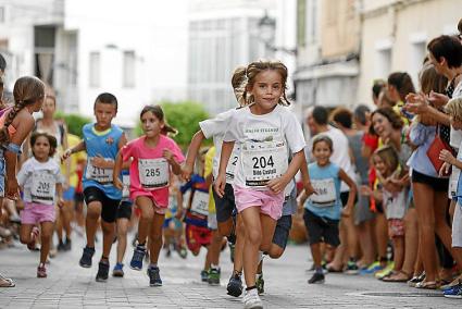 Rostros alegres por participar, Alaior ya está en fiestas