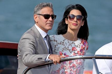 George Clooney y Amal Alamuddin en Venecia durante las celebraciones de su boda