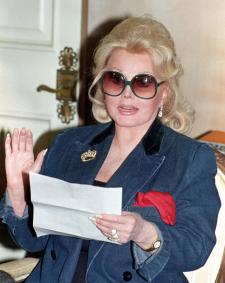 File picture of actress Zsa Zsa Gabor reading a statement at her home in Beverly Hills