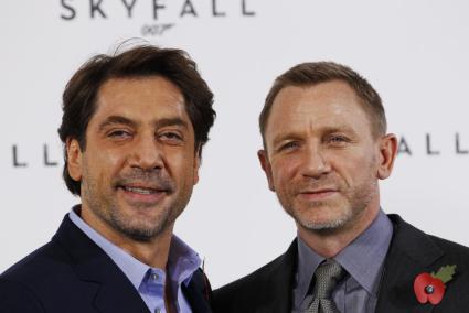 Actors Daniel Craig and Javier Bardem pose while launching the start of production of the new James Bond film "SkyFall" at a res