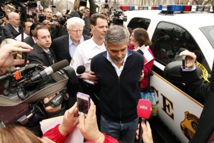 George Clooney is arrested for civil disobedience after protesting at the Sudan Embassy in Washington